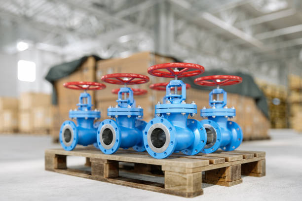 Close-up View Of Pipelines With Red Valves On Pallet In Warehouse